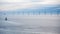 Panorama with offshore wind farm in morning