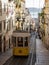 Panorama of old historic yellow street cable car funicular Ascensor da Bica Elevador lift railway tram Lisbon Portugal