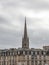 Panorama of the old town of Bordeaux, France, with the the tower of the Basilique Saint Michel basilica a cloudy afternoon