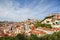 Panorama of the old town in Lisbon at sunny spring day, Portugal. On the hill `Igreja e Convento da Graca` Church