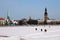 Panorama of Old Town from the snow-bound river Daugava.