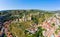 Panorama of the old town on Sololaki hill, crowned with Narikala fortress, the Kura river and cars traffic with blure in