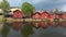 Panorama of old wooden barns on the banks of the river Porvoonjoki. Porvoo, Finland