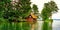 Panorama with old wooden boathouse in the sunset. Mecklenburg-Vorpommern, Germany