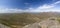 Panorama of outback Australia and deserted roads overlooking spectacular coastline from inside cave at Frenchman Peak near Esperan