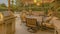 Panorama Outdoor kitchen and dining area under a pergola at the spacious patio of a home