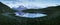 Panorama over the Bachalpsee during the famous hiking trail from First to Grindelwald Bernese Alps, Switzerland.