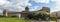 Panorama overlooking Kazan Cathedral, flowering bushes of beautiful flowers, resting people on a sunny spring day