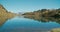 Panorama overview on travel of mountain beautiful lake with sky reflection