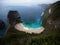 Panorama of Pantai Kelingking Beach blue turquoise tropical ocean limestone cliff Nusa Penida Island Bali Indonesia