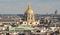 The panorama of parisian houses and cathedral Saint Louis, Paris