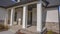 Panorama Pathway and stairs leading to the porch with pillars at the facade of a home