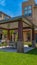 Panorama Patio with table and seats under the a roof supported by four pillars