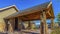 Panorama Pavilion and driveway by the entrance of a house under blue sky on a sunny day