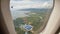 Panorama of the Philippine islands from the window of a flying airplane. Shooting during a flight over the tropical