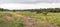 Panorama photo during an overcast day of the field `Patersmoer` near Strijbeek, Netherlands