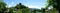 Panorama picture of alpine tirol city of Ladis, Austria - Lake, traditional buildings, castle and mountains background