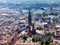 This is a panorama picture which include the old minster church in Freiburg, Germany. With a helicopter pass by