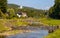 Panorama of Pieniny Mountains over Grajcarek creek joining Dunajec river in Szczawnica Zdroj springs resort town in Lesser Poland