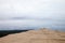 Panorama of the Pilat Dune Dune du Pilat during a cloudy afternoon with a pine forest in background.