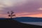 Panorama pink sunset,misty hills mountain tops in pink dawn