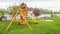 Panorama Playground equipment and small pool at the spacious backyard of a house