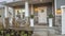 Panorama Porch and yard at the facade of a home with stairs leading to the front door