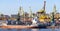 Panorama of the port quay with a big boat in the background of the buildings