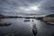 Panorama of Prague, Czech Republic, seen from the Vltava river, also called Moldau, with a focus on tourists boat and ships