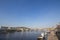 Panorama of Prague, Czech Republic, seen from the Vltava river, with a focus on Palackeho Most bridge and the riverbnaks.