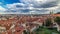 Panorama of Prague Old Town with red roofs timelapse, famous Charles bridge and Vltava river, Czech Republic.