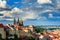 Panorama of Prague from Petrin gardens, Castle and St. Vitus cathedral visible of the left, bridges