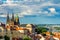Panorama of Prague from Petrin gardens, Castle and St. Vitus cathedral visible of the left, bridges