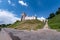 Panorama promenade overlooking the old city and historic buildings of medieval castle near wide river