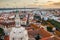 Panorama red roofs of Lapa Lisbon Portugal, european city, dome of estrela basilica, cathedral, basil or church, drone