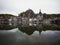 Panorama reflection of Dinant citadel old town historic village in Meuse river Ardennes Namur Wallonia Belgium