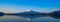 Panorama Reflection of Fuji mountain with snow capped in the morning Sunrise at Lake kawaguchiko, Yamanashi, Japan