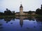 Panorama reflection of yellow stone Schloss Karlsruhe Castle Palace Schlosspark in Baden Wurttemberg Germany Europe