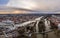 Panorama of Regensburg city in Bavaria with the river Danube the cathedral and the stone bridge during flood and snowmelt at sunse