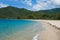 Panorama of a remote Colombian beach of white sand and beautiful vegetation