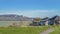 Panorama Residences with view of the lake and mountain under blue sky on a sunny day