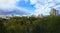 Panorama of residential disctrict of Moscow with beautiful clouds in the blue sky â€“ soviet houses and large park