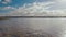 Panorama of Reykjavik city in sunny calm weather, view from city beach, water of Atlantic ocean