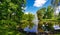 Panorama of the Riga Canal against the background of beautiful Kronvalda Park