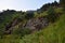 Panorama of rocks covered with trees. Caucasus, North Ossetia