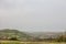 Panorama of the rural landscape of the village of Ripanj, with the Vozdovac settlement in background, during a rainy afternoon.