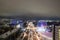 Panorama of the Russian city of Kirov from a height on a winter night. Oktyabrsky Avenue and Ferris Wheel in the New