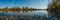 Panorama from Sacramento river levee on a clear fall day with reflections