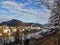 Panorama of Salzburg, Austria. River canal that separate town of Salzburg. Mountains at the background.