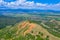 Panorama of sand pyramides and Bulgarian town Stob